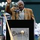 Hall of Famer Hank Aaron waves to the crowd as he is honored on the 40th anniversary of his 715th homer prior to the game between the Atlanta Braves and the New York Mets at Turner Field in Atlanta on Tuesday.
Kevin C. Cox/Getty Images